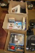 Three boxes of books relating to TV and Cinema including; Titanic, Monty Python, Laurel and Hardy