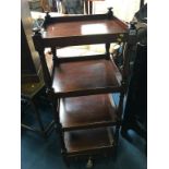 A 19th century mahogany four tier what not, with single drawer