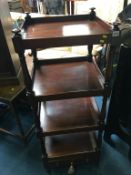 A 19th century mahogany four tier what not, with single drawer