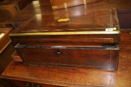 A 19th century rosewood brass bound Campaign style writing slope. 61cm wide