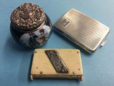 A small engine turned silver case, a silver top bottle and a bone vesta case (3)