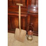 A Tilley lamp and a malt shovel