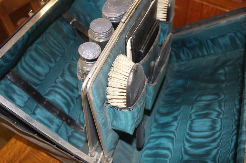 A John Pound leather case and a travelling vanity case, with five silver top bottles - Image 5 of 10