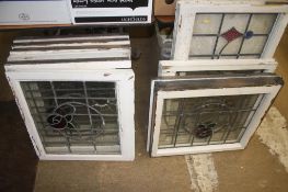 Ten leaded glass windows and a marble slab