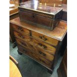 A Georgian mahogany straight front chest of drawers, with two short and three long graduated