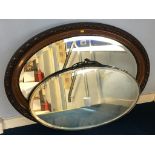 Two oval mirrors