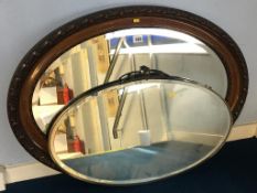 Two oval mirrors