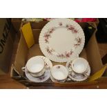 A Royal Albert 'Lavender Rose' tea set and a box of encrusted flower posies