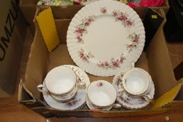 A Royal Albert 'Lavender Rose' tea set and a box of encrusted flower posies