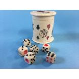 A small early 20th century bone container decorated with dice and playing cards, containing six