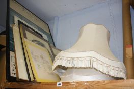 Two lamp shades and a selection of prints