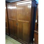 An Edwardian mahogany two door fitted wardrobe, 137cm wide x 193cm high