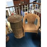 A wicker laundry basket and a chair