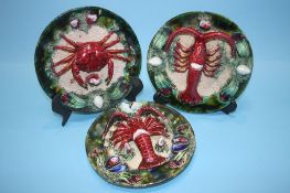 Two Roque Gaeras Obidos Palissy style plates, one decorated with a crab, the other with a lobster