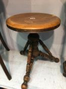A circular adjustable stool