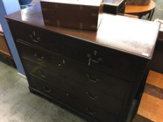 A 19th century straight front chest of drawers, with two short and three long graduated drawers,