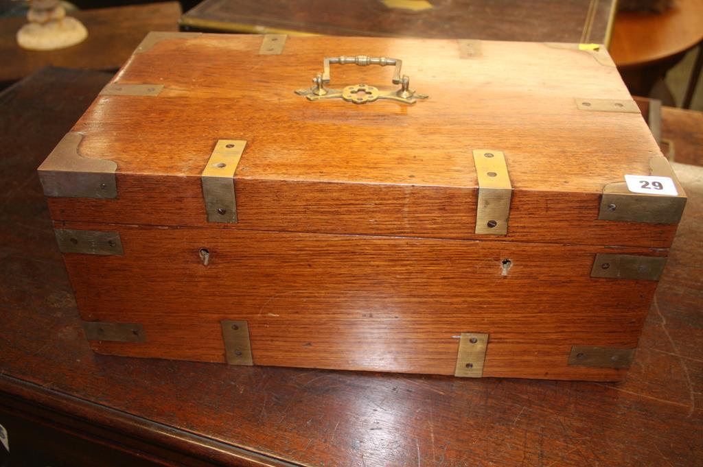 A Campaign style mahogany box, with brass banding