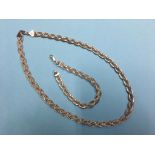 A 9ct white gold necklace and a matching bracelet. Weight 19.1 grams