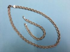 A 9ct white gold necklace and a matching bracelet. Weight 19.1 grams