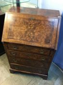 A walnut bureau, 61cm wide