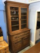 An Edwardian oak Secretaire bookcase, 122cm wide