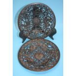 A pair of decorative Coalbrookdale style pierced plates, decorated with mythical figures