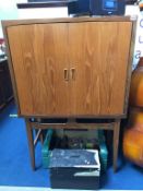 A Danish teak two door cocktail cabinet, 84cm wide x 127cm high