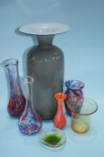 Seven pieces of coloured glassware