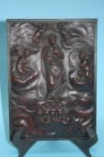 A carved wood relief Religious panel