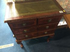 Reproduction mahogany chest of drawers, with inset leather top