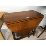 A small oak Old Charm drop flap table