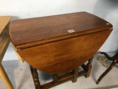 A small oak Old Charm drop flap table