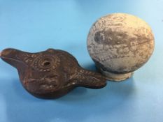 An early terracotta oil lamp and a Corinthian aryballos (2)