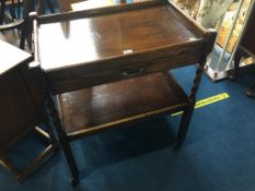 An oak barley twist tea trolley