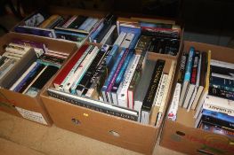 Five boxes of hard back books, both fictional and reference