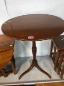 A 19th century tilt top circular mahogany tripod table, 52cm diameter