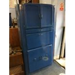 A blue painted Kitchen cabinet