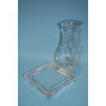 A Baccarat square shaped tapering vase and a Tiffany and Co. clear glass ashtray (2)