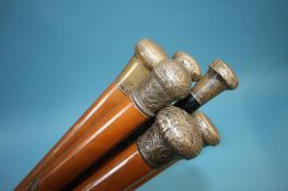 Seven silver topped canes