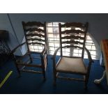 Pair of oak ladderback carver chairs