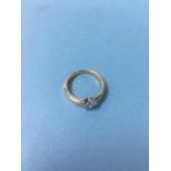 A diamond mounted ring, stamped 18K, size M/N, 3.4g