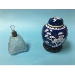 A Chinese blue and white ginger jar and cover and a triangular blue glass scent bottle