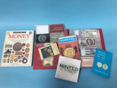 Collection of notes and coin collecting books