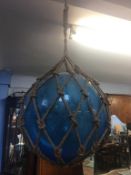 A large blue Witch ball