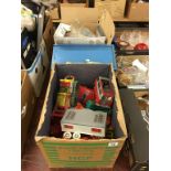 Three boxes of assorted vintage toys