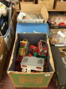 Three boxes of assorted vintage toys