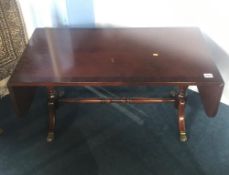 A reproduction mahogany Strongbow coffee table