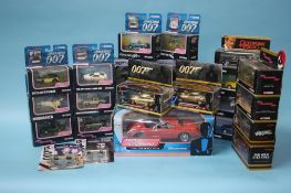Twenty six boxed James Bond 007 Corgi cars, a Corgi 007 The Definitive Bond Collection boxed set and
