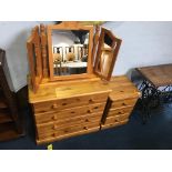 Two pine chest of drawers and a mirror