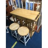 Four stools and a drop end table
